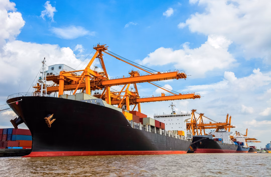Container ships at Batam port, illustrating Ship Agent Batam and port clearance services